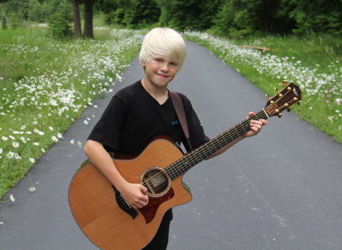 Carson Lueders With Guitar