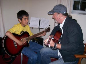Alan Hall with guitar